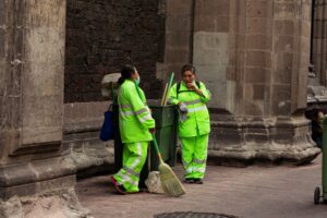 Street sweepers take a break in Francisco I. Madero Avenue