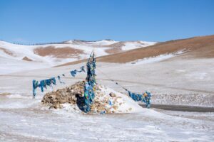 Locals circle these rock piles clockwise three times and add in a rock while chanting mantras Locals circle these rock piles clockwise three times and add in a rock while chanting mantras